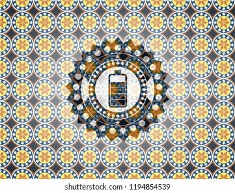 battery icon inside arabic style badge. Arabesque decoration.