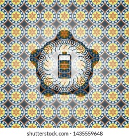 battery icon inside arabic style badge. Arabesque decoration.
