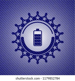 battery icon inside badge with denim texture