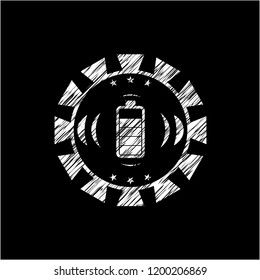 battery icon inside chalkboard emblem written on a blackboard