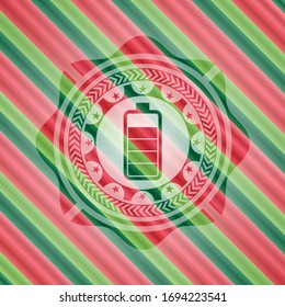battery icon inside christmas badge background.