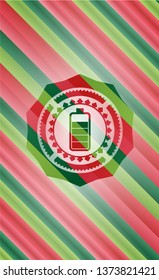 battery icon inside christmas colors style emblem.