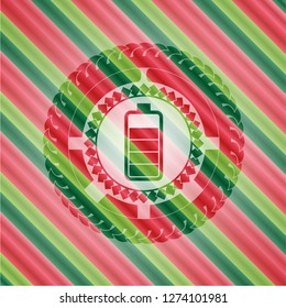 battery icon inside christmas emblem.