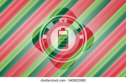 battery icon inside christmas style badge..