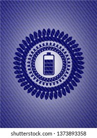 battery icon inside emblem with jean background