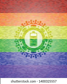 battery icon inside emblem on mosaic background with the colors of the LGBT flag