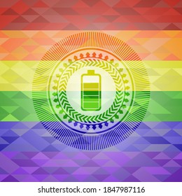 battery icon inside emblem on mosaic background with the colors of the LGBT flag. 