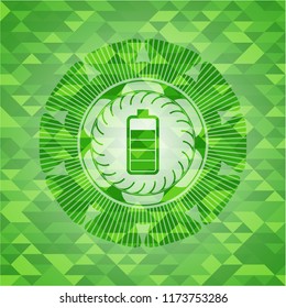 battery icon inside green emblem with mosaic background