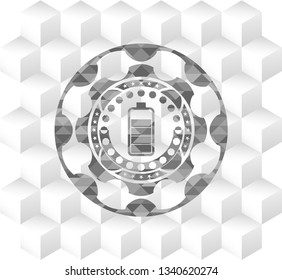 battery icon inside realistic grey emblem with cube white background