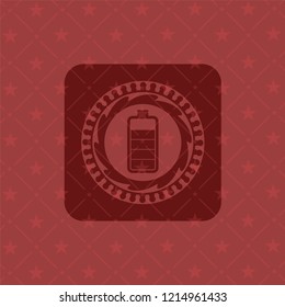 battery icon inside realistic red emblem