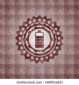 battery icon inside red seamless emblem or badge with abstract geometric pattern background.