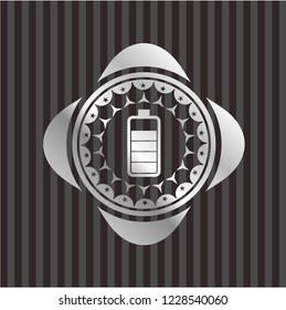 battery icon inside silvery emblem or badge