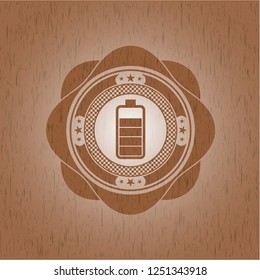 battery icon inside wood emblem. Vintage.