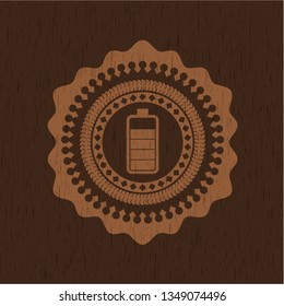 battery icon inside wooden emblem. Retro