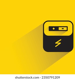 battery with shadow on yellow background
