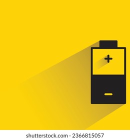 battery with shadow on yellow background