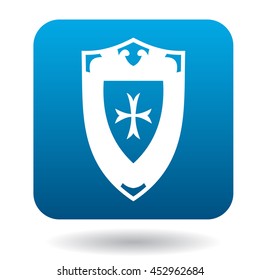 Battle shield with ornament icon in simple style in blue square. Weapon for war symbol