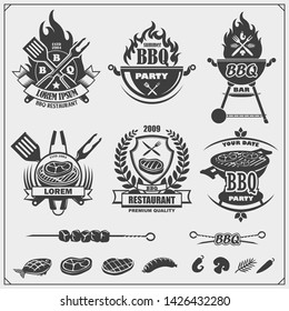 BBQ and grill labels set. Barbecue emblems, badges and design elements. Vector monochrome illustration.