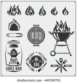 BBQ and grill labels set. Barbecue emblems, badges and design elements. Vector monochrome illustration.