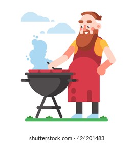 BBQ party. Kind man is cooking barbecue.