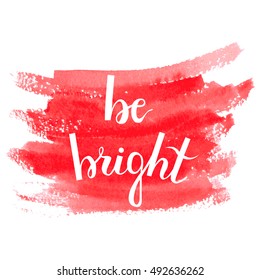 Be bright. Brush hand lettering. Watercolor red background