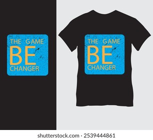 Diseño de camiseta "Be the Game Changer": texto amarillo en negrita en la camiseta negra, mensaje inspirador para el liderazgo y el impacto