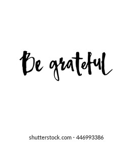 Be grateful,ink hand lettering. Modern brush calligraphy. Handwritten phrase. Modern brush calligraphy. Isolated on white background. Hand drawn lettering element for your design.