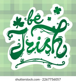 "Be Irish" - vector lettering. Celtic boho style. For a greeting card design. St. Patrick's Day celebration. Tartan seamless background. Sticker design.