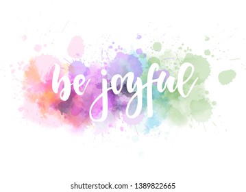 Be joyful - motivational handwritten modern calligraphy handlettering. On light pastel coloring watercolor paint background