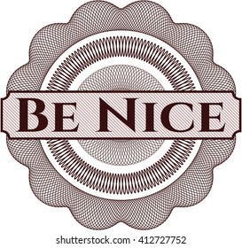 Be Nice written inside rosette