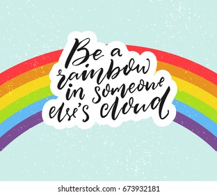 Be a rainbow in someone else's cloud. Positive inspiration quote with rainbow at blue sky background.