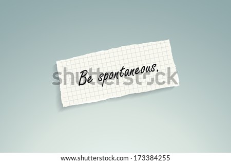 Be spontaneous. Hand writing text on a piece of math paper on a blue background. (EPS10 Vector)