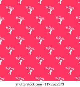 Be strong hand drawn motivational inscription with ribbon on a pink background. National Breast Cancer Awareness Month seamless pattern.