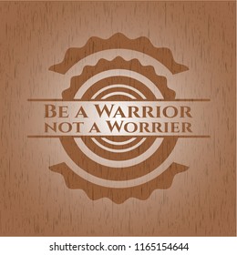 Be a Warrior not a Worrier badge with wooden background