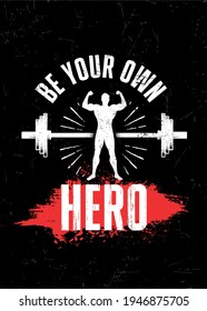 Be Your Own Hero. Gym Typography Inspiring Workout Motivation Quote. Barbell Illustration On Rough Wall Urban Background With Brush Stroke