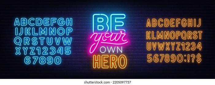 Be Your Own Hero neon quote on brick wall background.