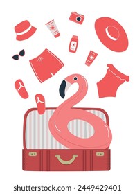 Beach accessories falling into a red suitcase. Red swimsuit, swimming trunks, hat, sunglasses, flip flops, sunscreen, camera, flamingo swimming ring. Packing suitcase for summer vacation. Hello Summer