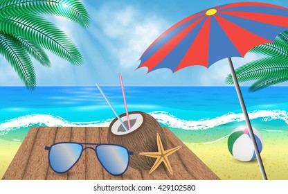 beach accessories for summer holidays on wooden table by the sea