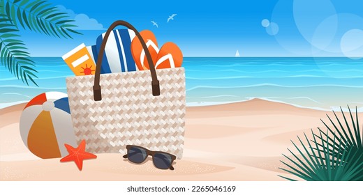 Bolsa de playa con accesorios de playa en la arena y bellas vistas al paisaje marino en segundo plano, espacio para copiar