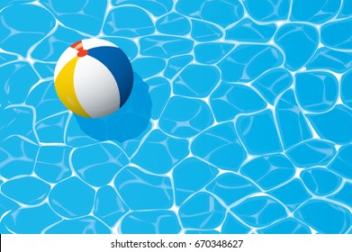 beach ball floating in a blue swimming pool. Summer background.