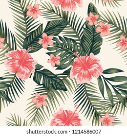 Beach cheerful wallpaper hibiscus plumeria tropical leaves seamless vector pattern on a light yellow background