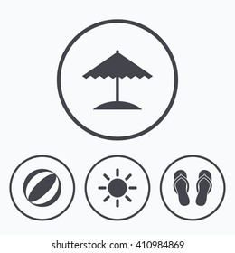 Beach holidays icons. Ball, umbrella and flip-flops sandals signs. Summer sun symbol. Icons in circles.