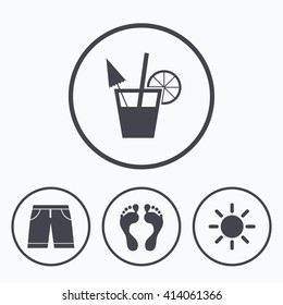 Beach holidays icons. Cocktail, human footprints and swimming trunks signs. Summer sun symbol. Icons in circles.