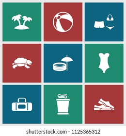 Beach icon. collection of 9 beach filled icons such as swimsuit, palm, inflatable pool and umbrella, turtle, slippers, towels. editable beach icons for web and mobile.