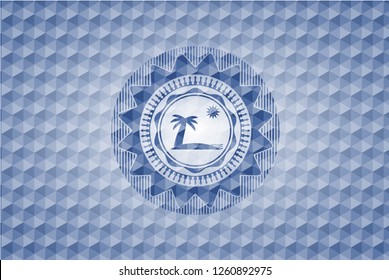 beach icon inside blue emblem or badge with geometric pattern background.