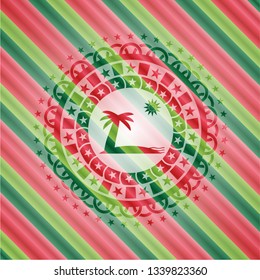 beach icon inside christmas emblem.