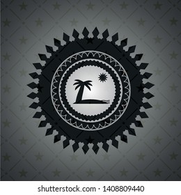beach icon inside dark badge or emblem