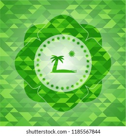 beach icon inside green emblem with mosaic background