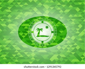 beach icon inside green mosaic emblem