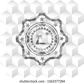 beach icon inside grey badge with geometric cube white background